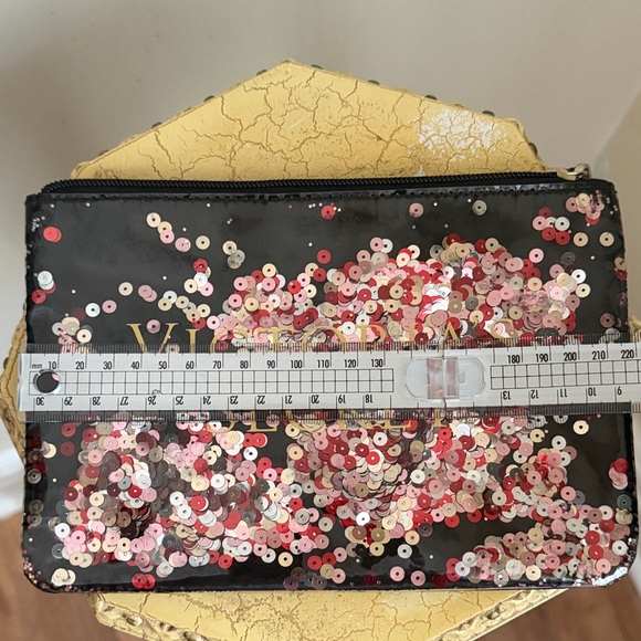 Victoria's Secret Black Clutch with Pink Sequins
NWOT - Picture 3 of 5
